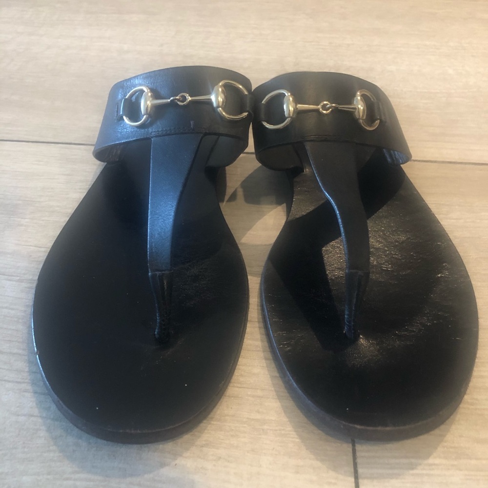 Black Gucci sandals